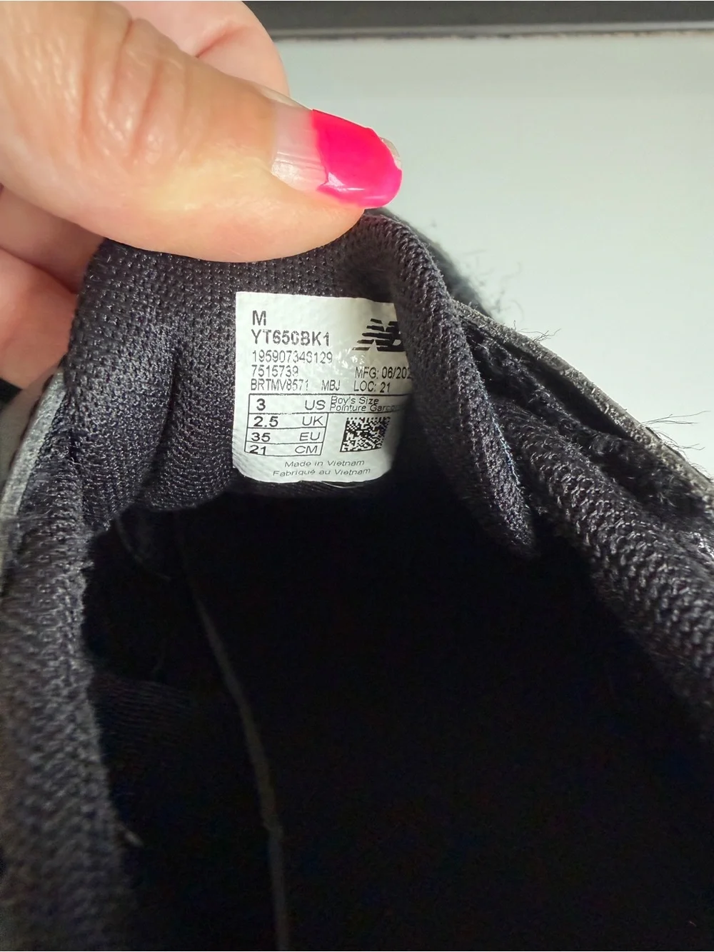 New Balance Kids Black and White Sneakers
